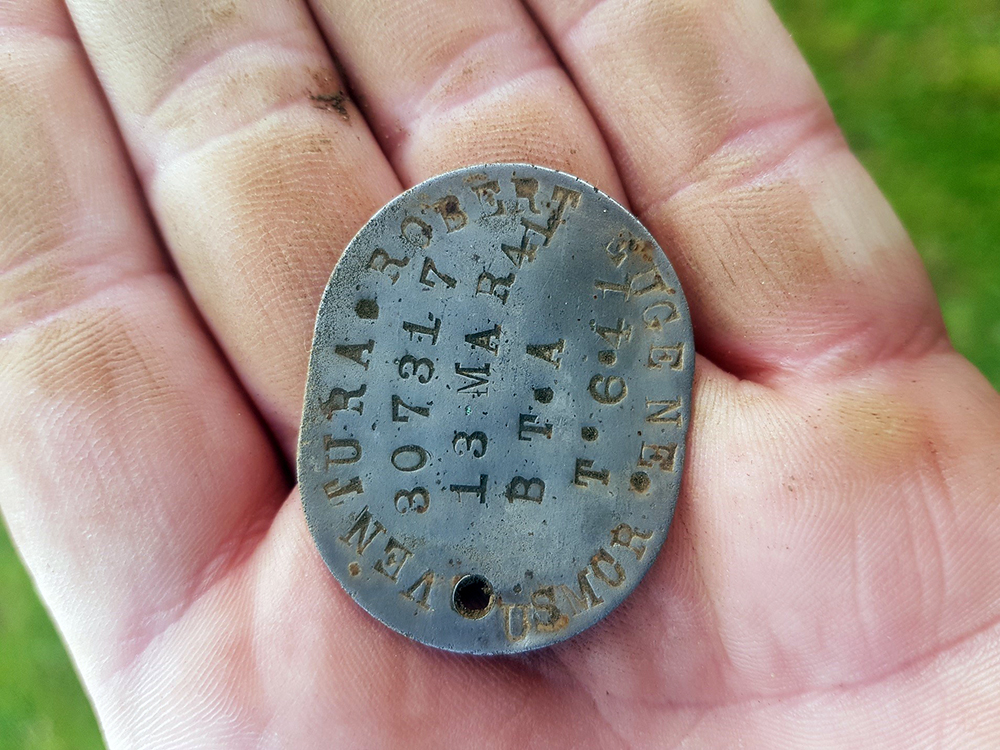 World War II veteran Robert Ventura's dog tags found in New Zealand.